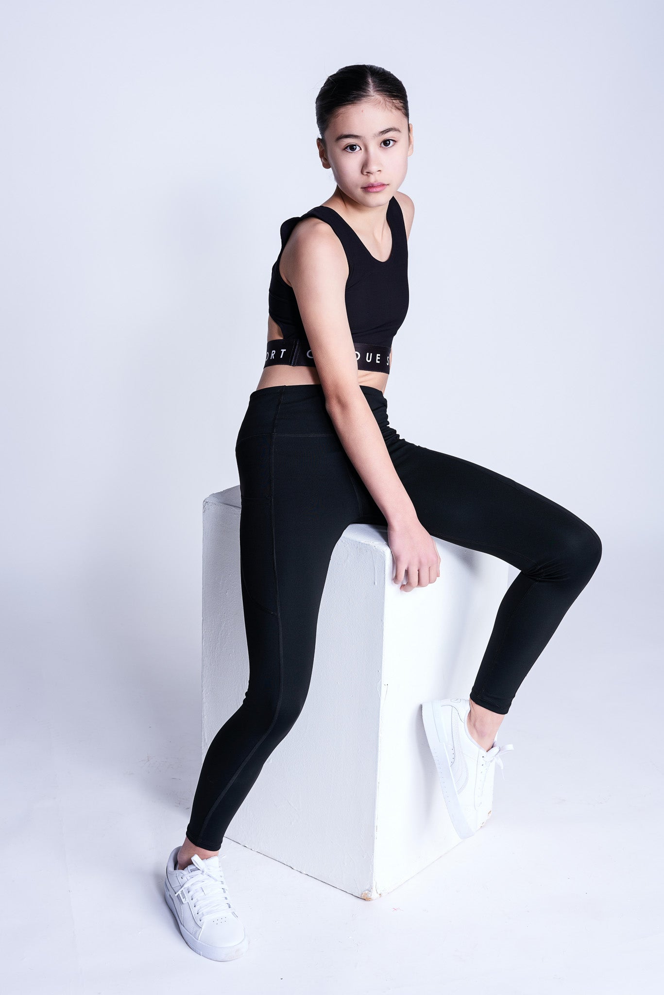 Empower Crop Top in Zwart