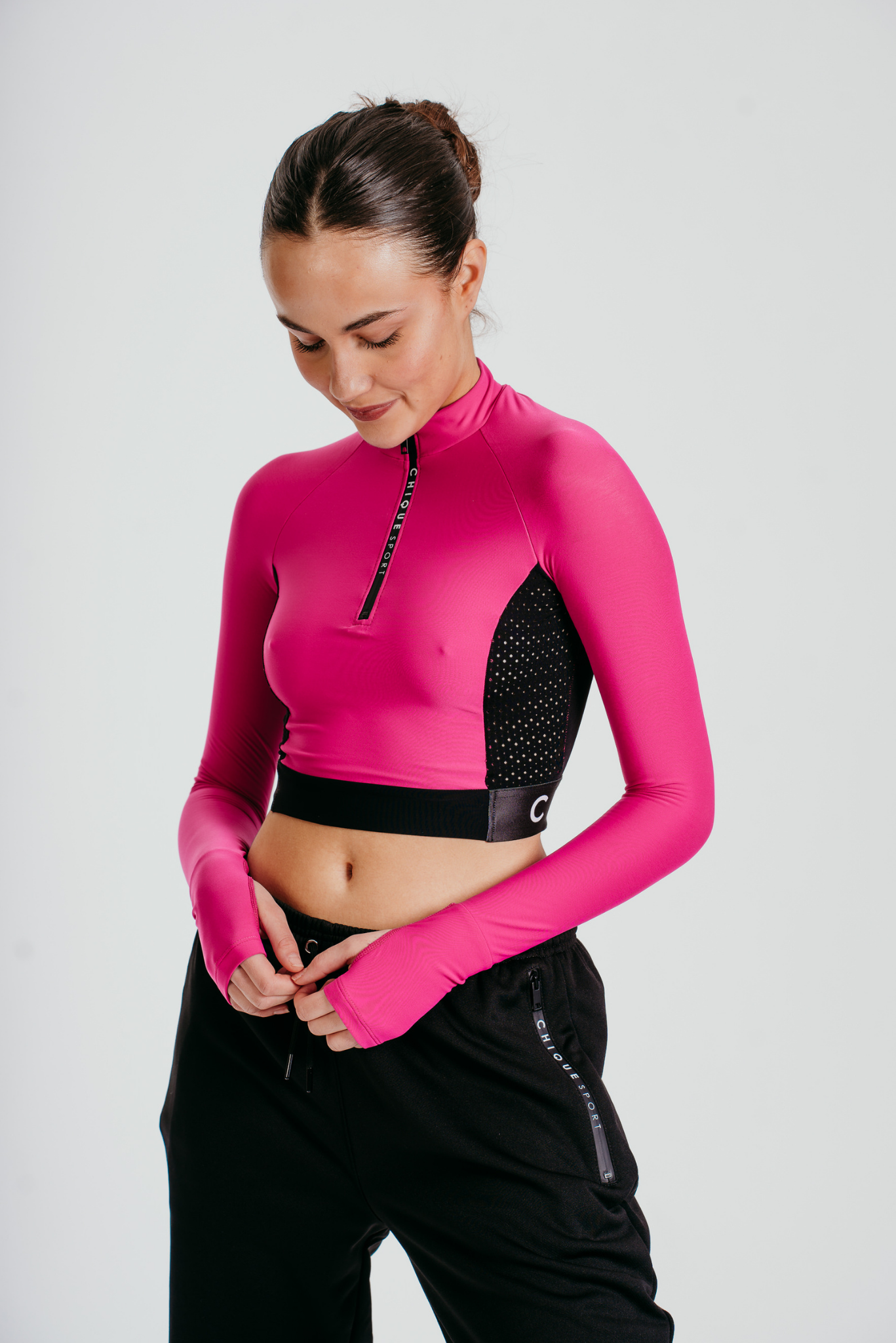 Ignite Langarm-Crop-Top in Fuchsie